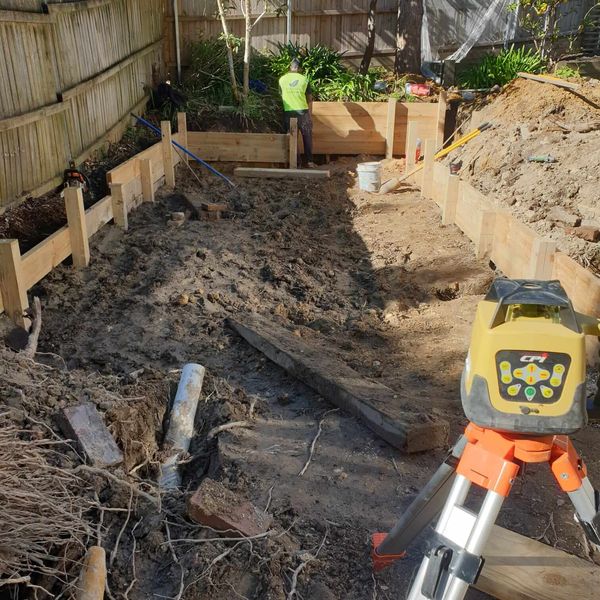 Excavation set out with a laser level and timber formwork